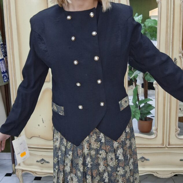 Conjunto chaqueta y falda