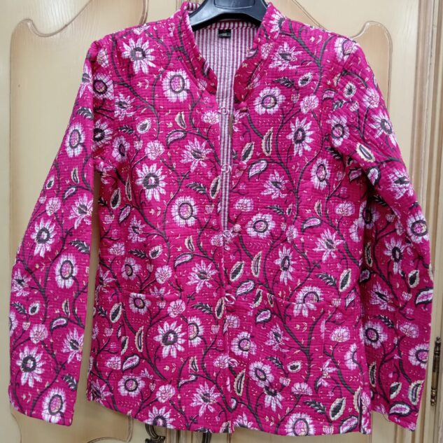 Chaqueta reversible fucsia flores y rayas