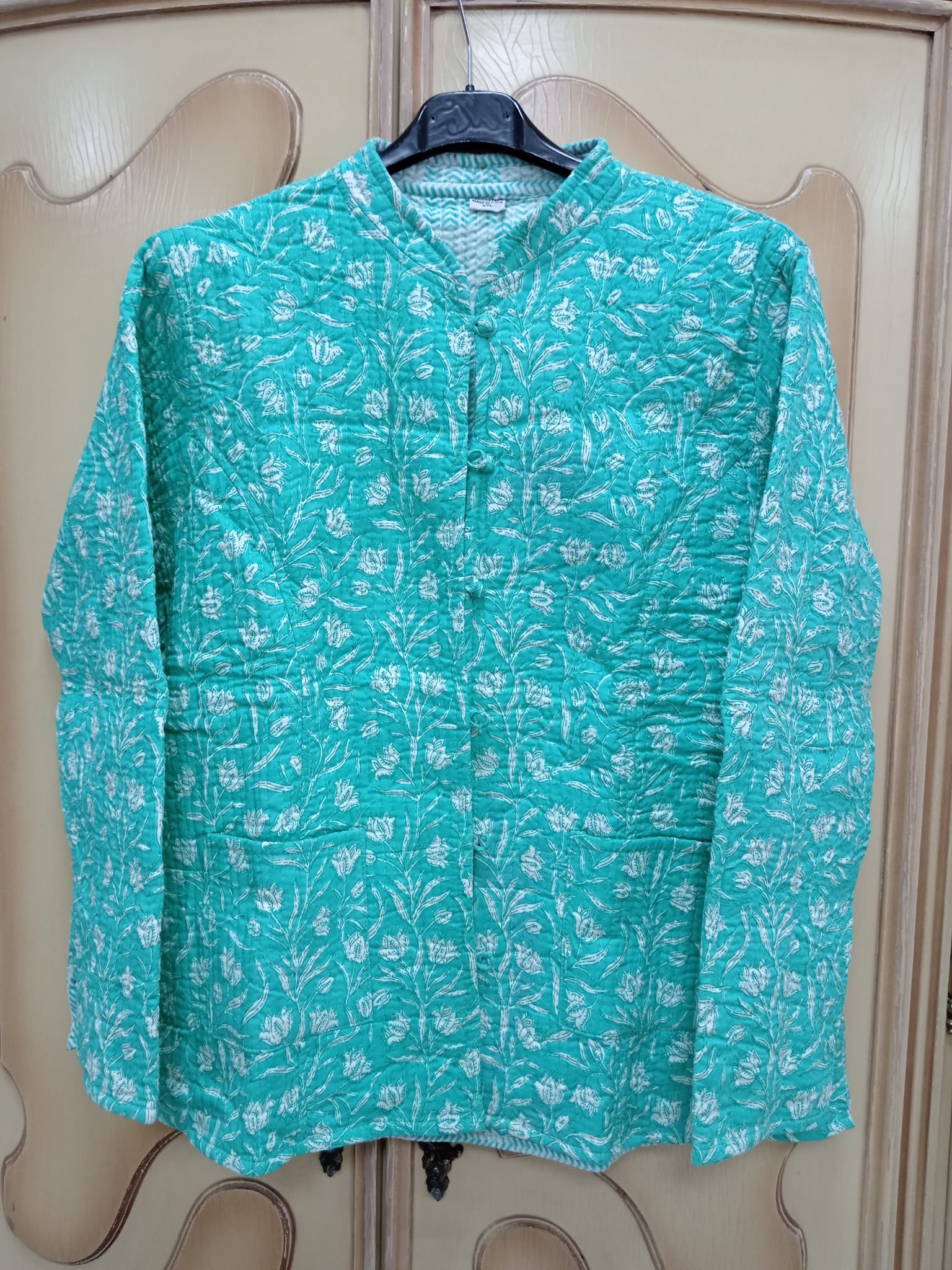 Chaqueta reversible verde agua