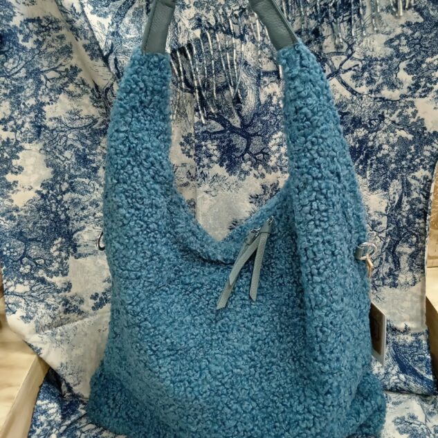 Bolso de caracolillo color azul azafata