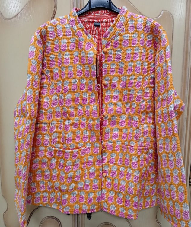 Chaqueta reversible piñas